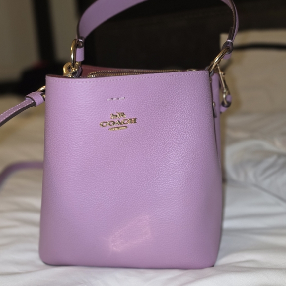 Coach Handbags - Coach Lavender Pebbled Leather Crossbody Bucket Bag with Gold Hardware